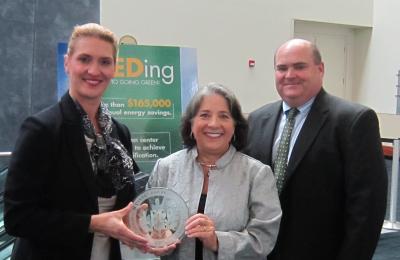 Knoxville Mayor Madeline Rogero (center) presents Knoxville Convention Center General Manager Mary Bogert (left) and Knoxville Convention Center Director of Operations Jason Bourgoyne (right) with a plaque signifying the facility's LEED Silver certification for Existing Buildings by the U.S. Green Building Council. The facility is the first convention center in Tennessee to be LEED certified.